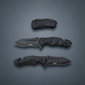 Black folding knife with open and closed positions